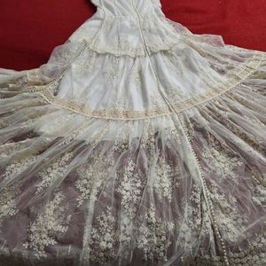 Wedding dress. Size 5, small but can be altered.